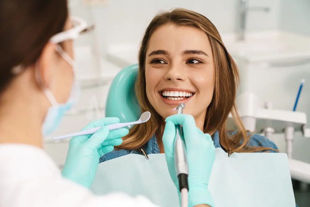 Woman smiling at the dentist.